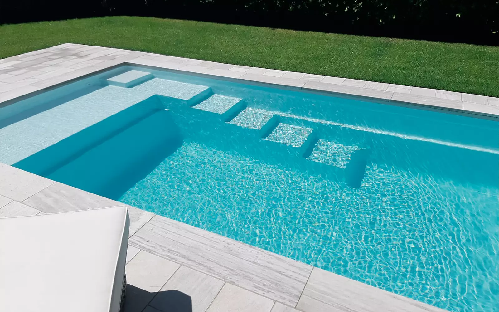 Leisure-Pools-Pinnacle-Fiberglass-Pool-Model-Hero The Elite™, a fiberglass pool design manufactured by Leisure Pools