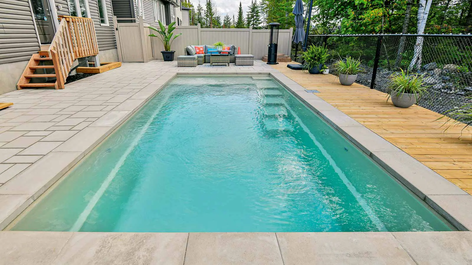 Leisure-Pools-Pinnacle-Fiberglass-Pool-Model-Hero The Precision™, a fiberglass pool design manufactured by Leisure Pools