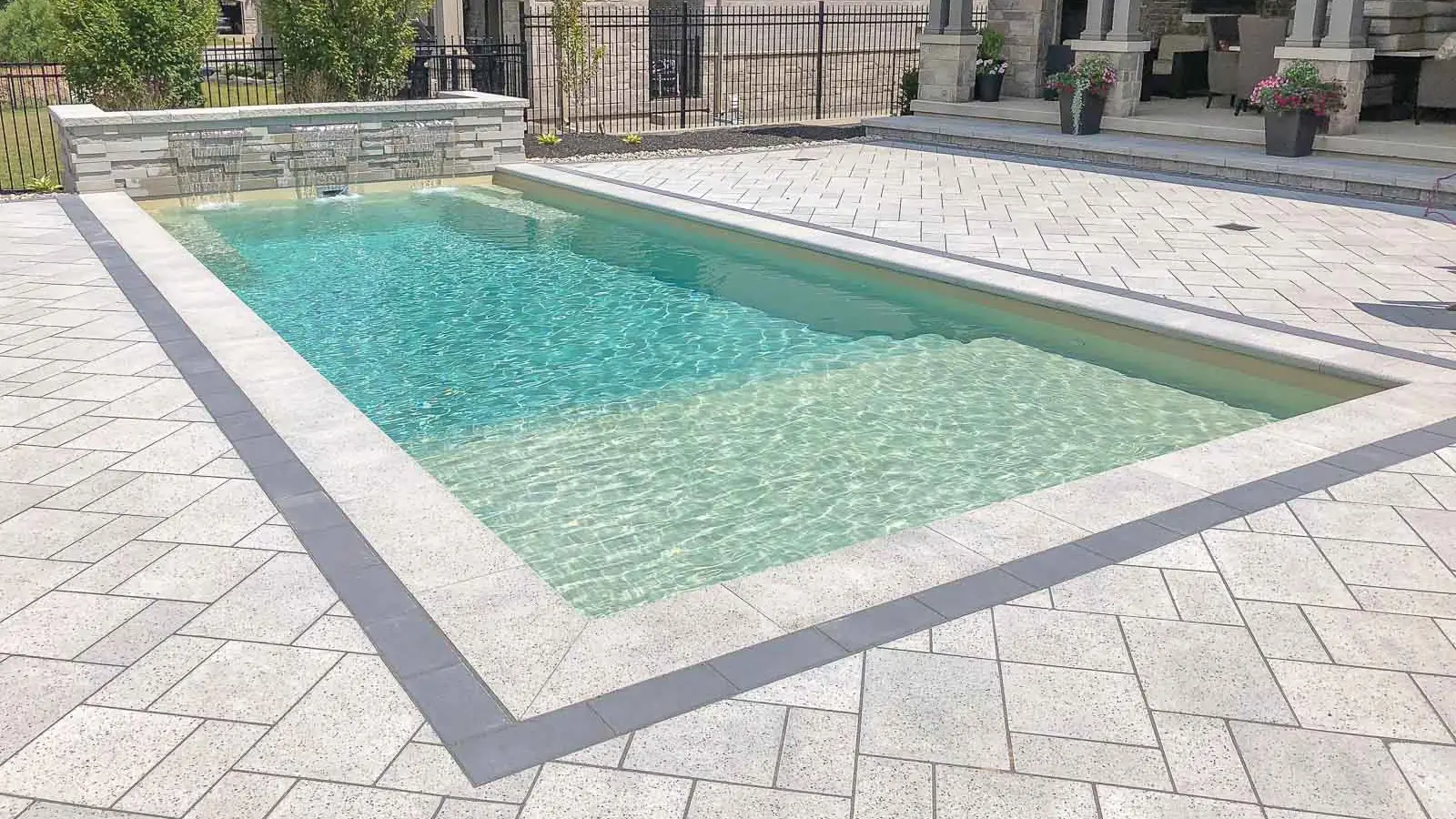 Leisure-Pools-Pinnacle-Fiberglass-Pool-Model-Hero The Summit™, a fiberglass pool design manufactured by Leisure Pools